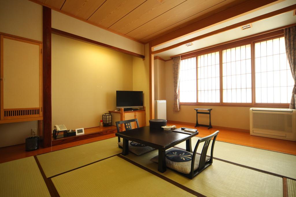 Okaerinasai Hotel Iwanai Ruang foto